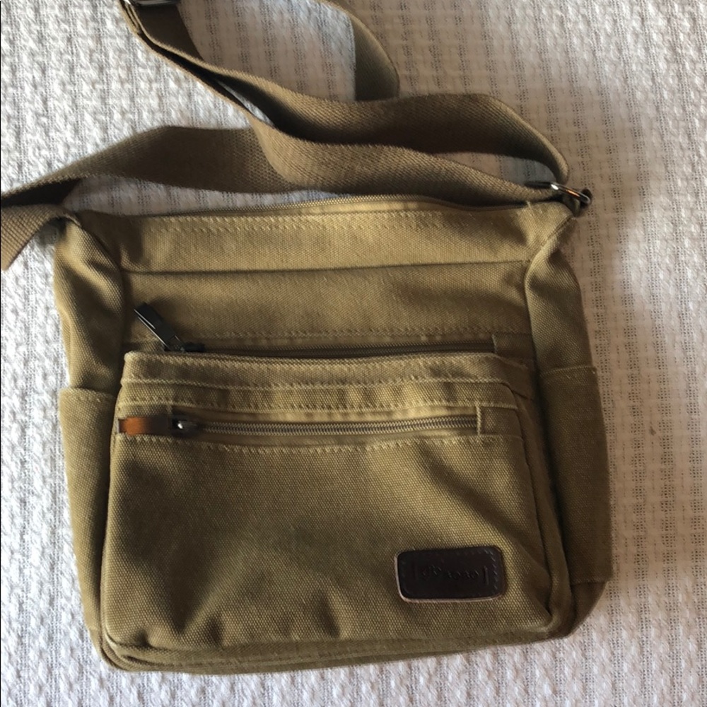 Tan canvas Bobo purse with adjustable strap